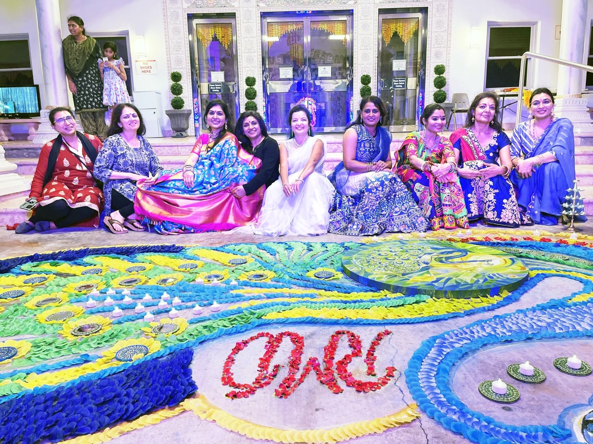 Completed Diwali Rangoli at Radha Madhav Dham with celebrants