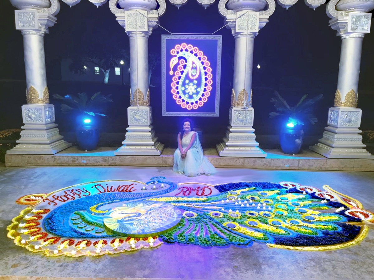 Completed Diwali Rangoli, close-up of the peacock design